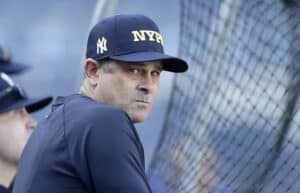 NEW YORK, NEW YORK - SEPTEMBER 11: Manager Aaron Boone #17 of the New York Yankees looks on during batting practice before a game against the Kansas City Royals at Yankee Stadium on September 11, 2024 in New York City.