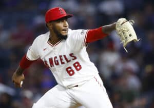 ANAHEIM, CALIFORNIA - JULY 10: José Marte #68 of the Los Angeles Angels throws against the Texas Rangers in the seventh inning at Angel Stadium of Anaheim on July 10, 2024 in Anaheim, California.