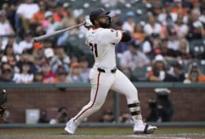 SAN FRANCISCO, CALIFORNIA - SEPTEMBER 15: Heliot Ramos #17 of the San Francisco Giants hits a solo home run against the San Diego Padres in the bottom of the ninth inning at Oracle Park on September 15, 2024 in San Francisco, California. In honor of Roberto Clemente day some players around the league have chosen to wear the jersey number 21.